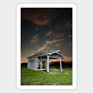 Shack on a meadow at night Sticker